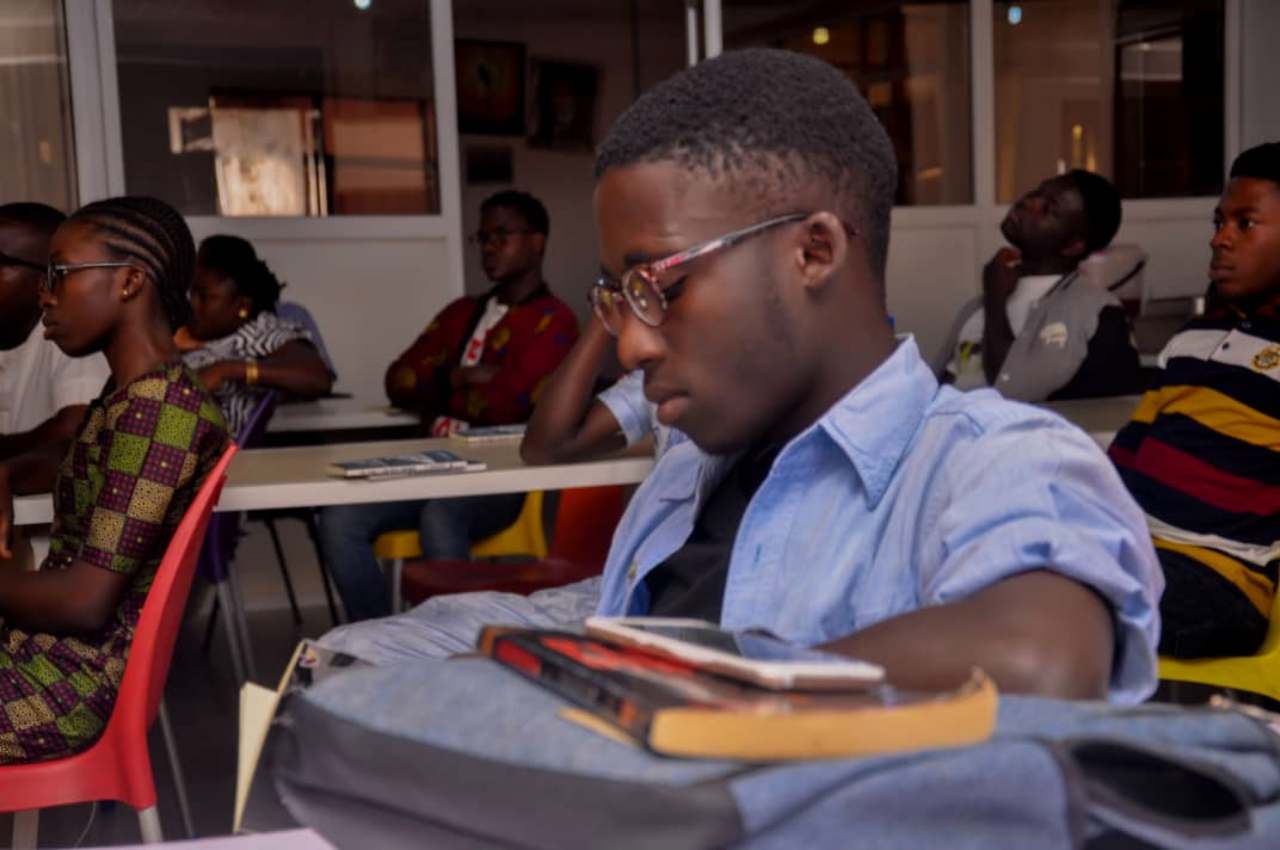 A reader at a COAL book event